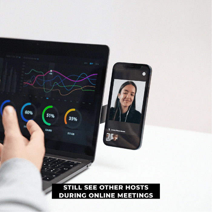 EDGE® Full Kit - Productivity magnetic kit - EDGE® Full Kit - Productivity magnetic kit - Carrara White - Magnetic phone holder in Basalt Grey holding smartphone beside laptop with colorful data charts on screen. - Rolling Square EDGE® Full Kit - Productivity magnetic kit - Carrara White - Magnetic phone holder in Basalt Grey holding smartphone beside laptop with colorful data charts on screen. - Rolling Square