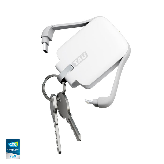 TAU® - Always-charged power bank - TAU® - Always-charged power bank - Charcoal Black - Compact white TAU® power bank with retractable cable and keyring attachment showcasing sleek minimalist design. - Rolling Square TAU® - Always-charged power bank - Charcoal Black - Compact white TAU® power bank with retractable cable and keyring attachment showcasing sleek minimalist design. - Rolling Square