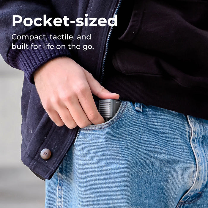 Hand inserting a pocket-sized Supertiny into a jeans pocket with text highlighting it's compact size.