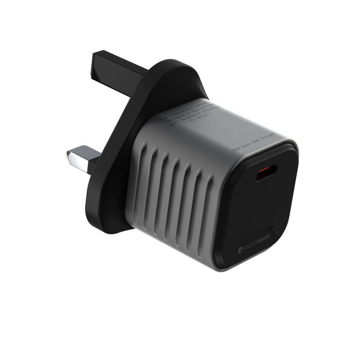 Supertiny - The smallest 65W GaN Charger ever - UK - Compact gray and black 65W GaN wall charger with UK plug and USB-C port. - Rolling Square